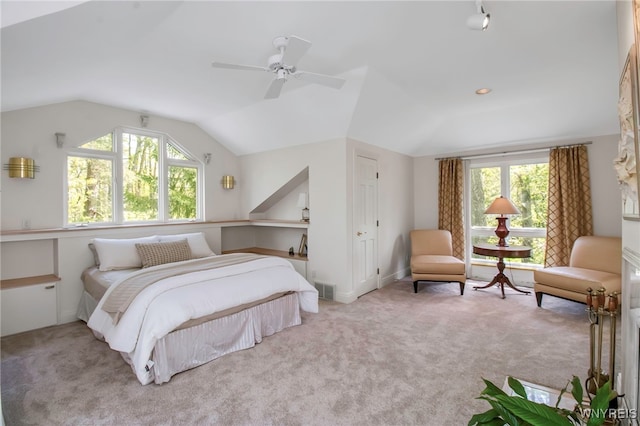 52 Hidden Pines Ct, Amherst, NY 14051 - bedroom with multiple windows, carpet flooring, vaulted ceiling, and ceiling fan