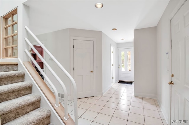 52 Hidden Pines Ct, Amherst, NY 14051 - entryway featuring stairway, baseboards, light tile patterned floors, and recessed lighting