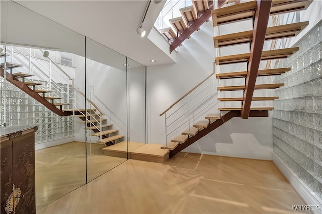 52 Hidden Pines Ct, Amherst, NY 14051 - staircase featuring baseboards