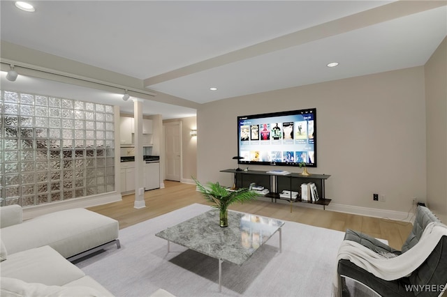 52 Hidden Pines Ct, Amherst, NY 14051 - living area featuring wood finished floors, baseboards, and recessed lighting