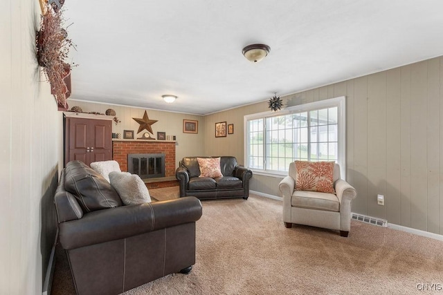 106 Hillside Way, Camillus, NY 13031 - living area with baseboards, light carpet, a brick fireplace, and wooden walls