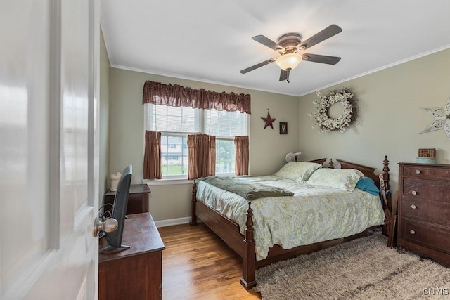 106 Hillside Way, Camillus, NY 13031 - bedroom featuring ornamental molding, wood finished floors, baseboards, and a ceiling fan