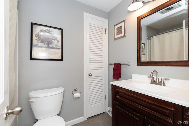 106 Hillside Way, Camillus, NY 13031 - bathroom featuring a closet, vanity, toilet, tile patterned floors, and baseboards