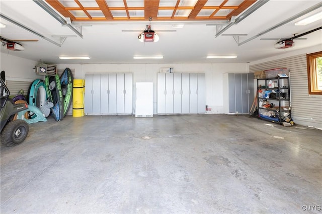 9182 S Rhodes Rd, Lodi, NY 14860 - garage with a garage door opener