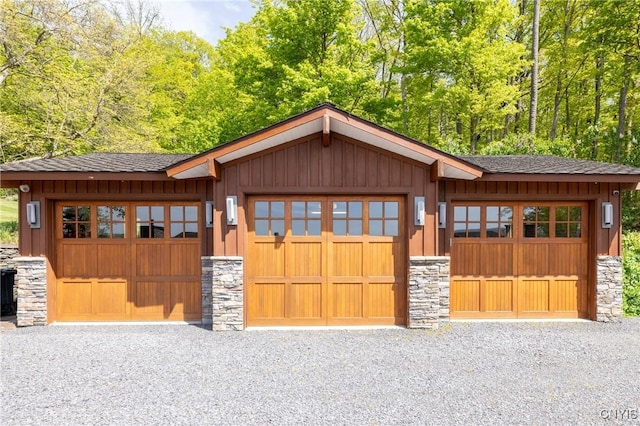 9182 S Rhodes Rd, Lodi, NY 14860 - view of front of property featuring stone siding, board and batten siding, and roof with shingles