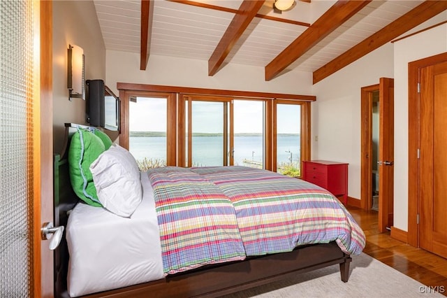 9182 S Rhodes Rd, Lodi, NY 14860 - bedroom with multiple windows, wood finished floors, and baseboards