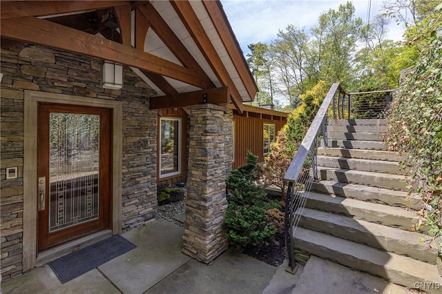9182 S Rhodes Rd, Lodi, NY 14860 - doorway to property with stone siding