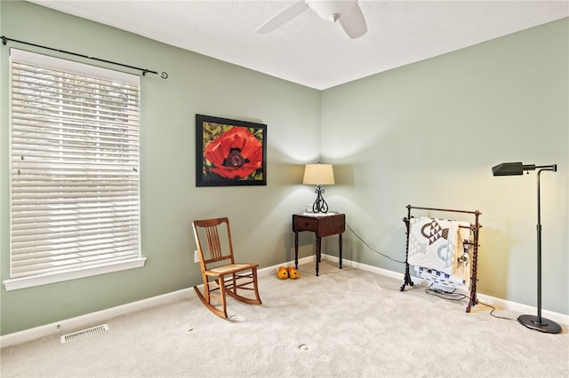 4166 Angela Way, Gorham, NY 14424 - living area featuring carpet, a ceiling fan, and baseboards