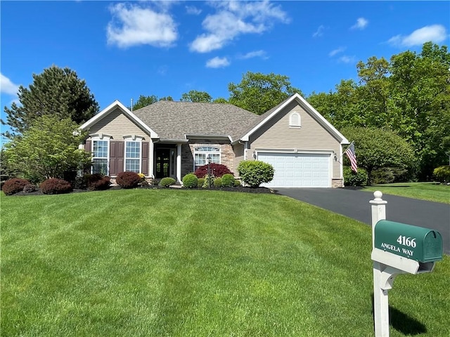 4166 Angela Way, Gorham, NY 14424 - view of front of property featuring a front yard, a garage, driveway, and stone siding