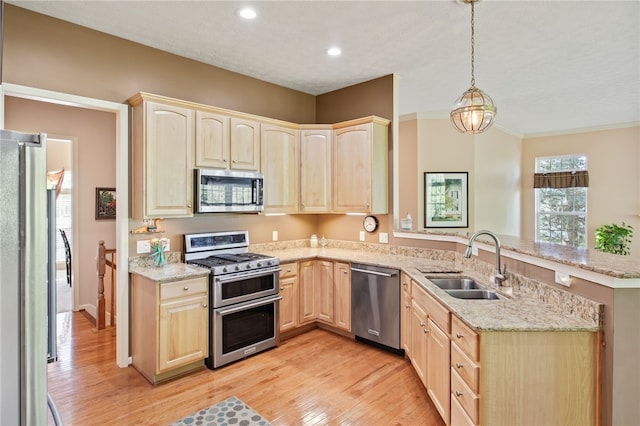 4166 Angela Way, Gorham, NY 14424 - kitchen featuring stainless steel appliances, light brown cabinetry, a sink, a peninsula, and light wood-type flooring