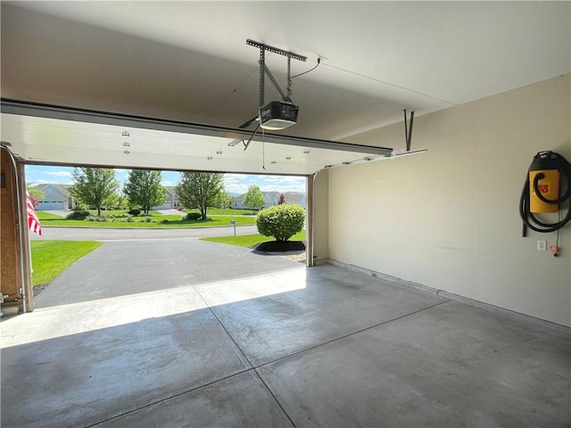4166 Angela Way, Gorham, NY 14424 - garage featuring a garage door opener
