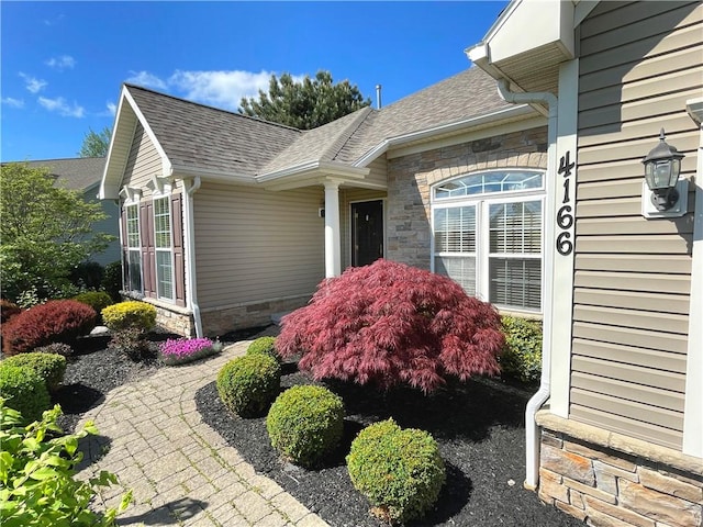 4166 Angela Way, Gorham, NY 14424 - entrance to property featuring stone siding and a shingled roof