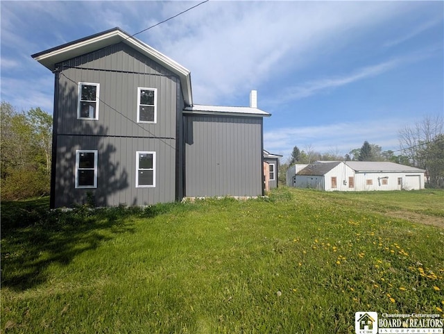 132 Kipp St, Sherman, NY 14781 - back of property featuring a lawn and a chimney