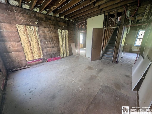 132 Kipp St, Sherman, NY 14781 - miscellaneous room with unfinished concrete flooring and stairs