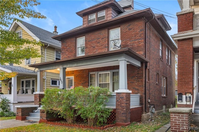 2452 Niagara Ave, Niagara Falls, NY 14305 - american foursquare style home featuring covered porch and brick siding