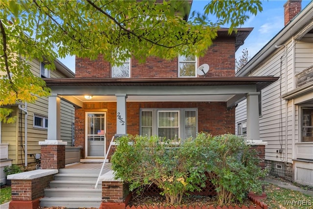 2452 Niagara Ave, Niagara Falls, NY 14305 - view of front of property featuring a porch and brick siding