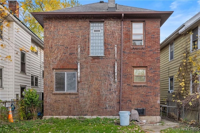 2452 Niagara Ave, Niagara Falls, NY 14305 - rear view of property featuring brick siding and a shingled roof