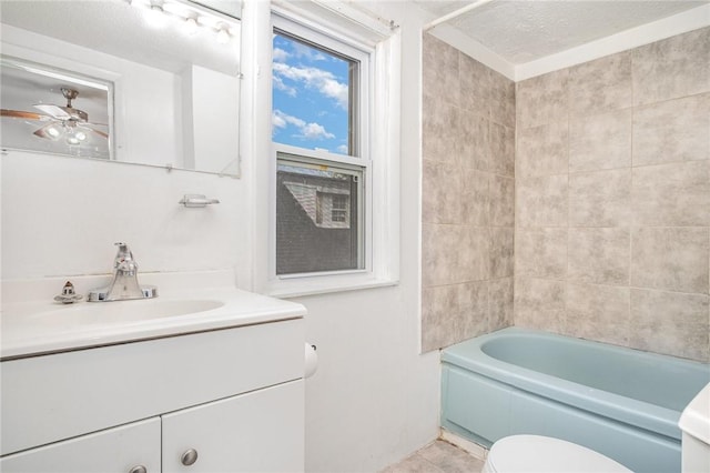 189 5th St, Rochester, NY 14605 - bathroom with vanity, toilet, a ceiling fan, shower / bathtub combination, and tile patterned floors