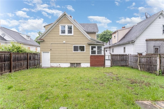 189 5th St, Rochester, NY 14605 - rear view of property with a chimney