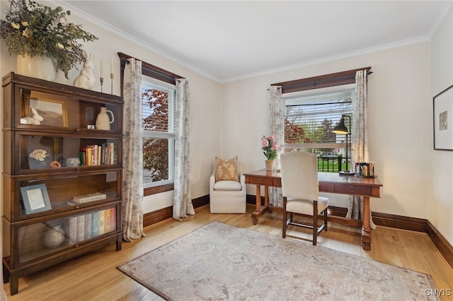 34-36 Hamilton Ave, Auburn, NY 13021 - sitting room with healthy amount of natural light, crown molding, wood finished floors, an office area, and baseboards