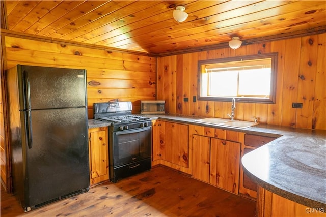 793 County Highway 19, Plainfield, NY 13491 - kitchen with black appliances, a sink, brown cabinets, wood ceiling, and dark wood-style floors