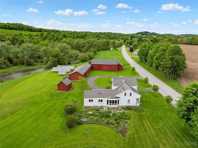 537 Earlville Rd, Hamilton, NY 13332 - aerial view of property and surrounding area featuring a heavily wooded area and a nearby body of water