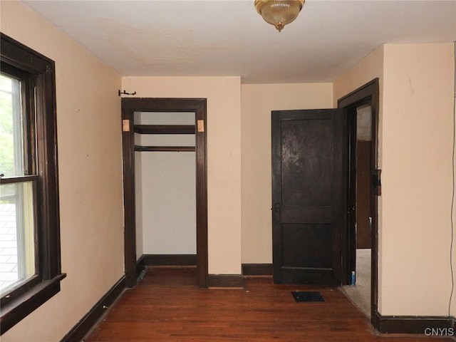 5 Evergreen St, Cortland, NY 13045 - unfurnished bedroom featuring wood finished floors and baseboards