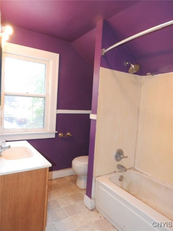 5 Evergreen St, Cortland, NY 13045 - full bathroom featuring vanity, toilet, bathing tub / shower combination, baseboards, and vaulted ceiling