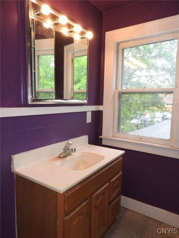 5 Evergreen St, Cortland, NY 13045 - bathroom featuring vanity, healthy amount of natural light, and tile patterned flooring