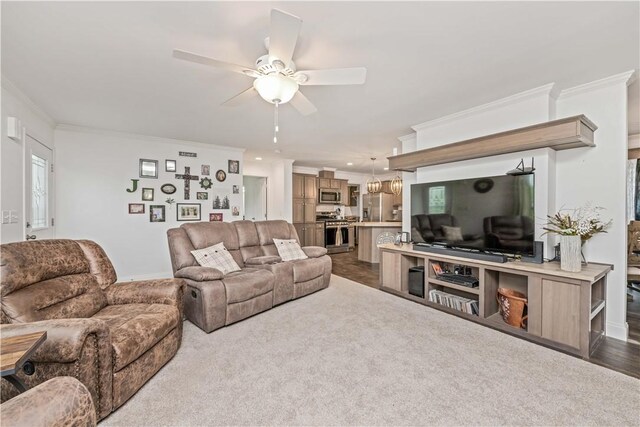 3854 Tari Ln, Murray, NY 14470 - living room featuring crown molding, a ceiling fan, recessed lighting, and dark carpet