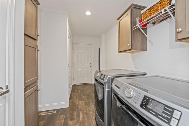 3854 Tari Ln, Murray, NY 14470 - laundry area featuring washer and dryer, dark wood finished floors, cabinet space, crown molding, and recessed lighting