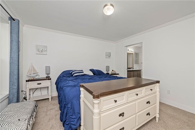 3854 Tari Ln, Murray, NY 14470 - bedroom with light colored carpet, ornamental molding, baseboards, and ensuite bath