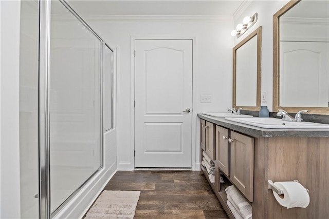 3854 Tari Ln, Murray, NY 14470 - full bath featuring wood finished floors, crown molding, a stall shower, and double vanity