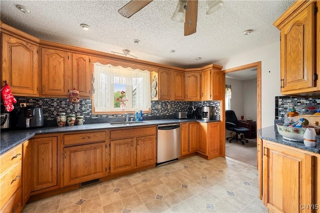 9748-9736 Podunk Rd, Lee, NY 13363 - kitchen featuring dishwasher, a sink, and brown cabinets