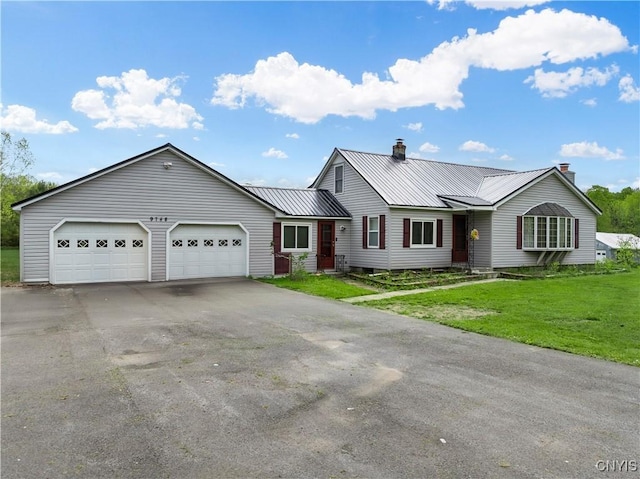 9748-9736 Podunk Rd, Lee, NY 13363 - ranch-style home with a chimney, a garage, a front yard, driveway, and metal roof