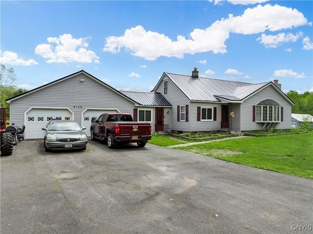 9748-9736 Podunk Rd, Lee, NY 13363 - ranch-style home with a chimney, driveway, a front yard, an attached garage, and metal roof