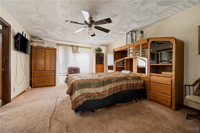 9748-9736 Podunk Rd, Lee, NY 13363 - bedroom featuring carpet flooring, baseboards, and a ceiling fan