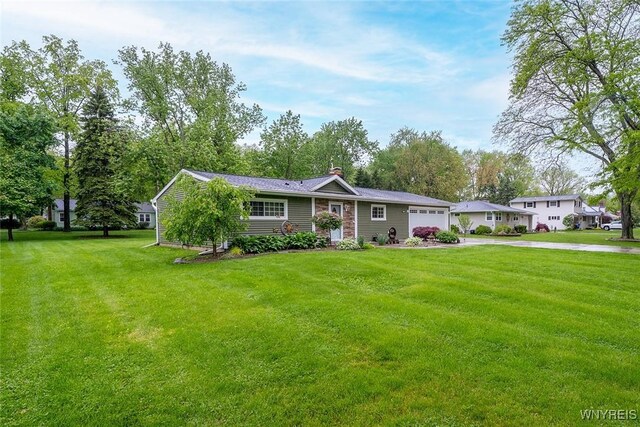 454 Kenwood Dr, Lewiston, NY 14092 - single story home featuring a garage, concrete driveway, a front yard, and a chimney