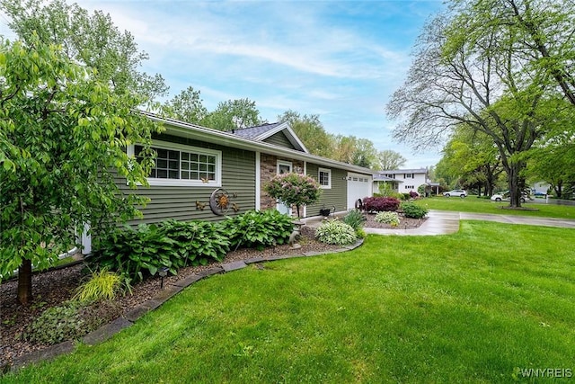 454 Kenwood Dr, Lewiston, NY 14092 - view of front of home featuring an attached garage and a front yard