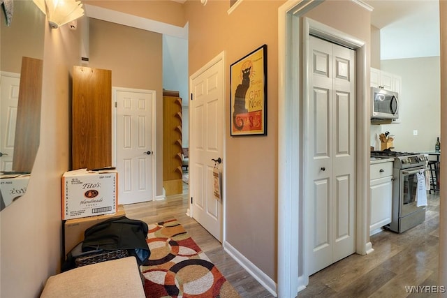 454 Kenwood Dr, Lewiston, NY 14092 - corridor with light wood-style flooring