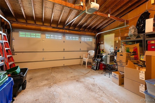 454 Kenwood Dr, Lewiston, NY 14092 - garage featuring a garage door opener