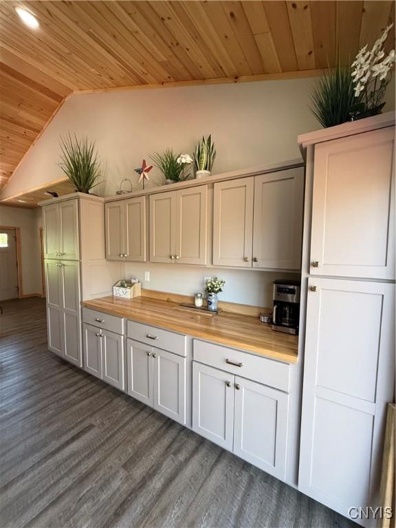 26633 Kring Point Rd, Alexandria, NY 13679 - kitchen with wood ceiling, dark wood finished floors, vaulted ceiling, and butcher block countertops