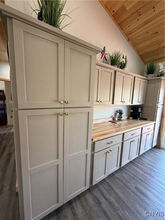 26633 Kring Point Rd, Alexandria, NY 13679 - kitchen with lofted ceiling, wooden ceiling, and dark wood finished floors
