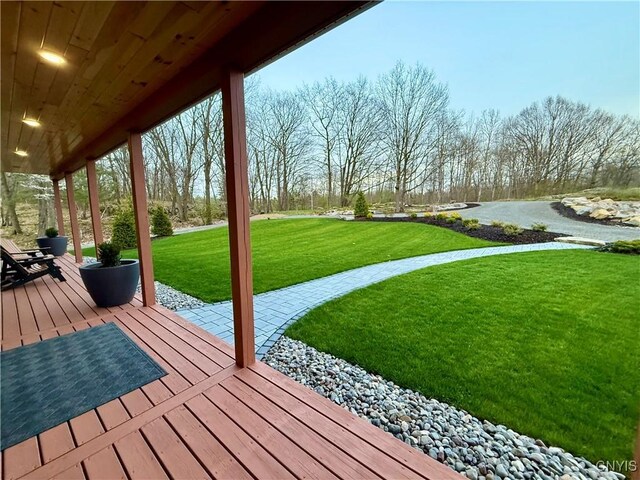 26633 Kring Point Rd, Alexandria, NY 13679 - wooden deck with a yard