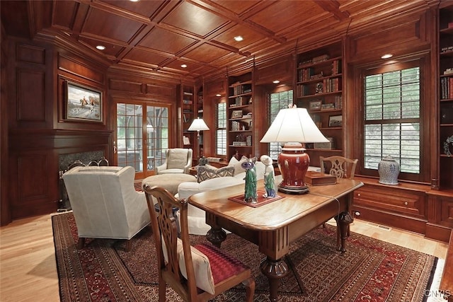 7106 Braxton Cir, Dewitt, NY 13066 - sitting room with wood ceiling, built in shelves, wood walls, light wood-style flooring, and a high end fireplace