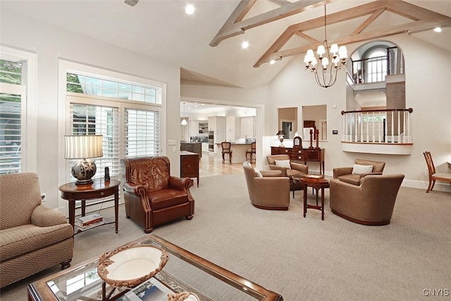 7106 Braxton Cir, Dewitt, NY 13066 - living room with carpet flooring, a chandelier, high vaulted ceiling, and baseboards