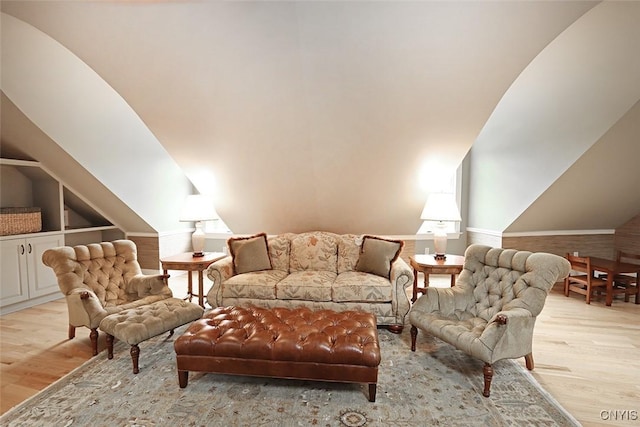 7106 Braxton Cir, Dewitt, NY 13066 - living area with wood finished floors and lofted ceiling