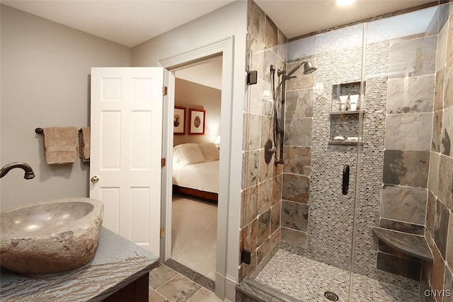 7106 Braxton Cir, Dewitt, NY 13066 - ensuite bathroom with a shower stall, vanity, and tile patterned floors