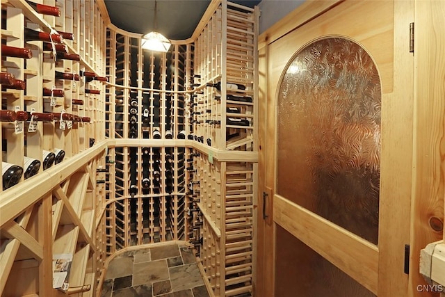 7106 Braxton Cir, Dewitt, NY 13066 - wine room featuring stone finish flooring
