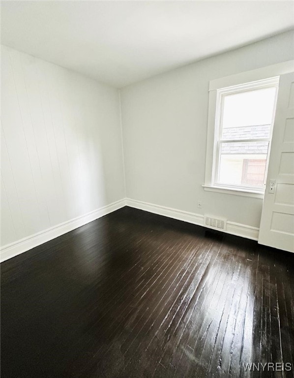 169 Davidson Ave, Buffalo, NY 14215 - spare room featuring dark wood finished floors and baseboards